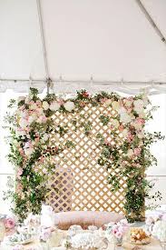 To make these backdrop garland lines you will use a needle on a string to feed marshmallows through the entire length. Flower Backdrops For Weddings Flower Backdrop Wedding Flower Wall Wedding Flower Wall Backdrop