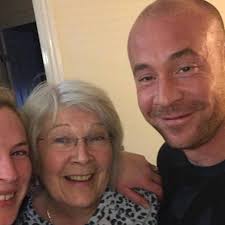 Needle felting a clothing article with roving