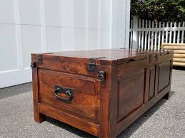 This is a sleek looking box framed herringbone coffee table. Crate Barrel Taka Trunk Coffee Table With Storage And Wine Rack Furniture Garden City New York Facebook Marketplace