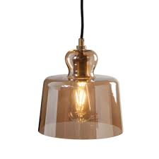 Gold bathroom light fixtures of different types like this give your space an upscale feeling without committing to a specific design style. Brass And Drum Champagne Glass Ceiling Pendant Light