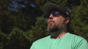 The student had a bullet in the chamber, the safety off and an additional  full magazine of bullets. The district says the matter has not been  settled.