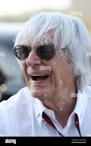 Bernie Ecclestone (GBR) CEO Formula One Group (FOM) is presented with gifts  by Manoj Gaur (IND) Executive Chairman and CEO Jaypee Group and Sameer Gaur  (IND), MD & CEO Jaypee Sports International