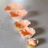 Using a fondant rolling pin, roll out the gum paste into a very thin sheet. 1