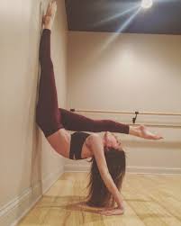 Forget The Mat Try These 25 Wall Yoga Poses Wall Yoga Yoga Asanas Yoga Photography