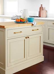 tan cabinets light butcher block