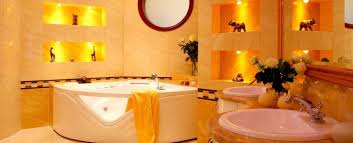 Generate a calming bathroom ambience by using a deep blend of cocoa, latte and black colors with clean white accents in the bathtub, sinks and toilet. 30 Best Relaxing Small Bathroom Designs Amazing Relaxing Bathroom Ideas On A Budget Decorate Times