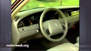 Image result for Medium Gold 1998 Town Car