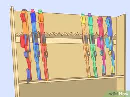 Attach 2 hooks spaced about the same length as your nerf gun for each gun you want to store and hang them over the hooks for quick, efficient storage. 3 Ways To Store Nerf Guns Wikihow