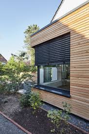 Hausfassade Holzvertafelung Fensterladen Fensterbank Garten Hausumbau Fenster Fe Fenster Fensterba In 2020 Facade House House Exterior Wooden Cladding