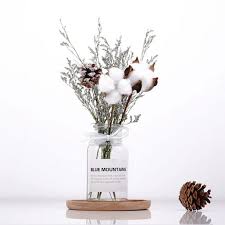 The variety of colors in this bouquet would be beautiful in an autumn arrangement or as wedding bouquets in a rustic themed wedding. Natural Dried Flowers Bouquet With Bottle Wedding Centerpieces Flower Arrangement Floral Decor Walmart Com Walmart Com