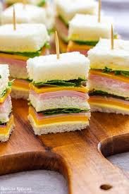 Ready in 10 minutes, these simple ham and cheese sandwiches are always a hit at any gathering! Mini Sandwiches For Party Appetizer Addiction
