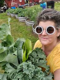 Century residents harvesting collards in our community