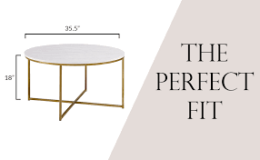 Rh's torano marble round coffee table:designed by timothy oulton, our table exemplifies the cool minimalism of 1970s italian design. Amazon Com Walker Edison Cora Modern Round Faux Marble Top Coffee Table With X Base 36 Inch White Faux Marble And Gold Furniture Decor