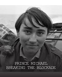 Circa 1967: Prince Michael takes the helm in a legendary show of courage!  With Sealand cut off by a government blockade, he joined the press aboard  the Ocean Cock to deliver much-needed