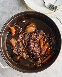 Spread out the onions and garlic in an even layer in a roasting pan and pour in the chicken stock. Why I Won T Be Making The Pioneer Woman S Pot Roast Again Pot Roast Roast Beef Recipes Pork Roast In Oven