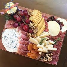 Place one or two vibrantly colored dips into bowls of varying size. 12 Best Cheese Platters And Charcuterie Boards