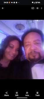 Can someone clean up this blurry and dark photo?