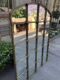 This wrought iron arbor gate is thicker and heavier than other doors on the market. Wrought Iron Arched Window Pane Mirror Gilded The Crown Collection