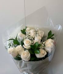 It's not different, it just means that you aren't trying to kill me. White Roses Bouquet By Lovely Blooms Decorations Corp