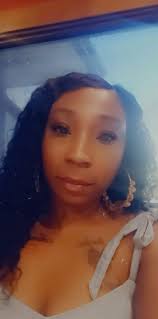 This morning I went walking to Paula Park off of Highway 933 in Galvez. I  came across this black telephone seems to be there's a debit card with the  Courtney Bourque name