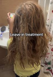 Lets attack my daughters knots. #leaveinconditioner #dollartreefinds #...