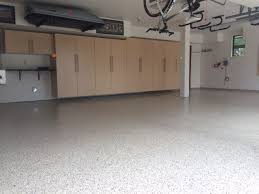 1 4 Iced Coffee Polyaspartic Floor With Maple Cabinets Cabinets Maplecabinets Garage Flooring Flake Garage Stora Flooring Maple Cabinets Custom Closets