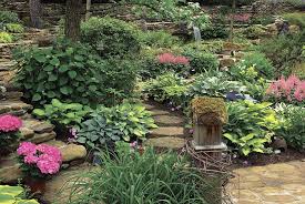Discover design techniques for shade gardens and choosing plants that will work with the rest of your landscape. Shade Garden Design Tips Garden Gate