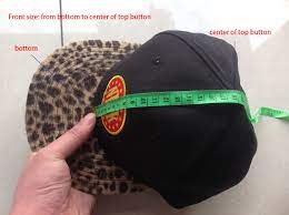 About an 1/8 above the forehead and ears. How To Measure Snapback Hats Size C T Headwear