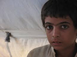 At the Razzaqabad IDPs camp in Karachi, Pakistan.