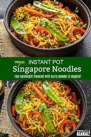 Rice Vermicelli Loaded With Vegetables And Seasoned With Curry Powder These Vegetarian Singapore Noodles Are In 2020 Vermicelli Recipes Singapore Noodles Pot Recipes