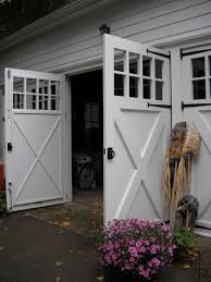 While we supply new garage doors, accessories and openers for residential and commercial uses, we also provide service and maintenance solutions for all types of installs in the dallas/fort worth area and offer unique products for. Out Swing Carriage Doors Invite Family And Friends With Open Arms Carriage House Doors Garage Door House Carriage House Garage Doors