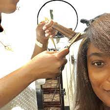 Take the end of one of the sections, tuck your hair around one of your fingers and roll up until you reach the roots. Everything You Need To Know Before Getting A Silk Press