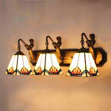 7 1/2 deep x 5 3/8 wide x 9 height *uses 1 (e26) medium base light bulb, 60 watt max *ul listed for bathroom wall installation above the mirror and vanity cabinet as well as powder rooms and make up rooms read more Tiffany Stained Glass Style Mermaid 24 Inch Bathroom Vanity Lighting Beautifulhalo Com