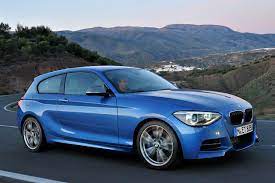 320 Horsepower Bmw M135i Headlines New Three Door 1 Series Range Bmw 1 Series Bmw Bmw Series