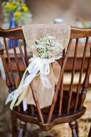 Cute Way To Dress Up Some Chairs At The Table Maybe For The A Team Or Bride And Groom Wedding Chair Decorations Wedding Chairs Burlap Decor