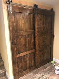 This Is A Custom Barn Door That Can Be Made To Fit Your Opening Common Pine Wood With The Most Character Possible Can Custom Barn Doors Farm Door House Doors