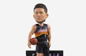 Across the chest of the jersey we see the rocky camelback mountain. You Need This Devin Booker Phoenix Suns City Edition Bobblehead