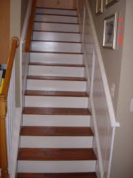 White Risers Make A Dark Wood Pop On Stairs White Stair Risers Stairs Cladding Furniture Design Wooden