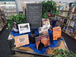 This Creative Display Of Books Vases And Greenery Invites Shoppers To Browse The Books Section At The Garnett Goodwil Creative Display Goodwill Store Goodwill
