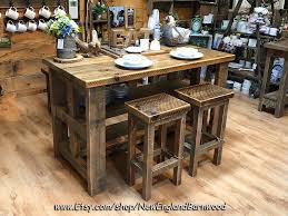 #kitchenisland #kitchenislands #interiordesign #homeaccessories #finishingtouches #interior123 #interior125 #interiorforall #housedecor #homeinteriors #passionforinterior #homestylehomestyling. Rustic And Charming Kitchen Island With Matching Bar Stools This Chunky Style Rustic Island Features Rustic Farmhouse Table Rustic Kitchen House Decor Rustic