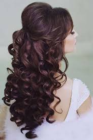 These half up half down hairstyles for long hair are perfect to wear to an event like a wedding, a night out on the town, prom, or even to class! Long Curly Hair Half Updos Glamorous Wedding Hair Wedding Hair And Makeup Bridesmaid Hair