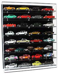 As one of the more rare and smaller scale sizes for toy cars, 1/43 scale cars are 43 times smaller than the real thing, but carry with them all of the sleek designs and details of their original counterparts. 1 43 Scale Model Car Wall Display Cabinet Model Display Cases