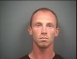 School custodian charged with having inappropriate contact with 2 students 