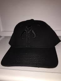 Warriors Of Mandalore Boba Fett Symbol Fitted Elastic Black On Black With Curved Brim From Spencer S Boba Fett Symbol Mandalore Boba Fett