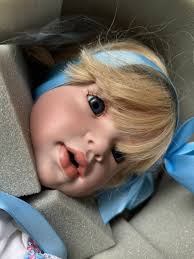 Millicent Wolfe with her doll, 1927. From the David Wolfe glass negatives. 