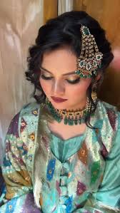 Hairstyle and eye makeup done by Sumreen Khan