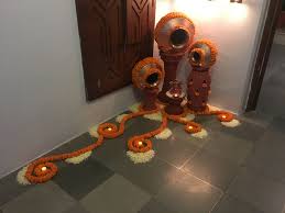 Arrangement Of Metal Pots With Marigold Flowers And Candles Vintage Flower Decor Flower Arrangements Diy Diwali Decorations At Home
