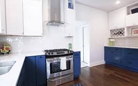 Mixed wood tones exist in the dark floors, the variegated tones in the bamboo shades, the ceiling fan, and decorative accents. Kitchen After Jpg 1 140 710 Pixels Modern Home Furniture Kitchen Inspirations Blue Kitchen Cupboards