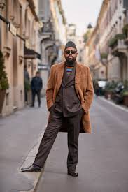 As you know camel color is a basic (or neutral) one. Men S Camel Overcoat Dark Brown Vertical Striped Suit Multi Colored Horizontal Striped Turtleneck Dark Brown Leather Loafers Lookastic