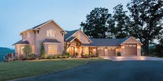 Living room with fireplace and wet bar, master bedroom with vaulted. Cheat Lake Residence Mills Group